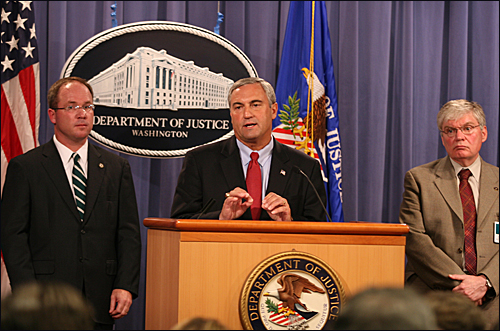 Joseph Persichini (center), Assistant Director in Charge of the FBI's Washington Field Office, with U.S. Attorney Jeff Taylor (left), District of Columbia, and Chief Postal Inspector Alexander Lazaroff of the U.S. Postal Service, explains recent developme