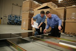 Engineers inspect solar panels for installation in So Cal Edison's project