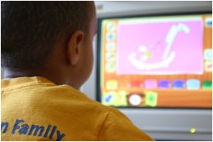 Boy on a computer.